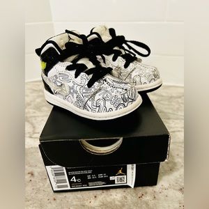 Baby boys white and black Jordans.